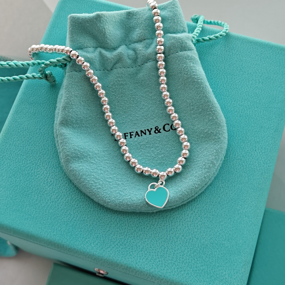 Tiffany & Co. Silver Bead Necklace with Blue Heart Pendant